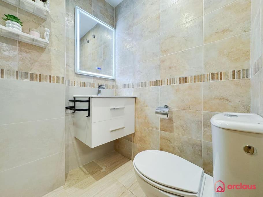 El Jardin Apartment โอโรเปซาเดลมาร์ ภายนอก รูปภาพ