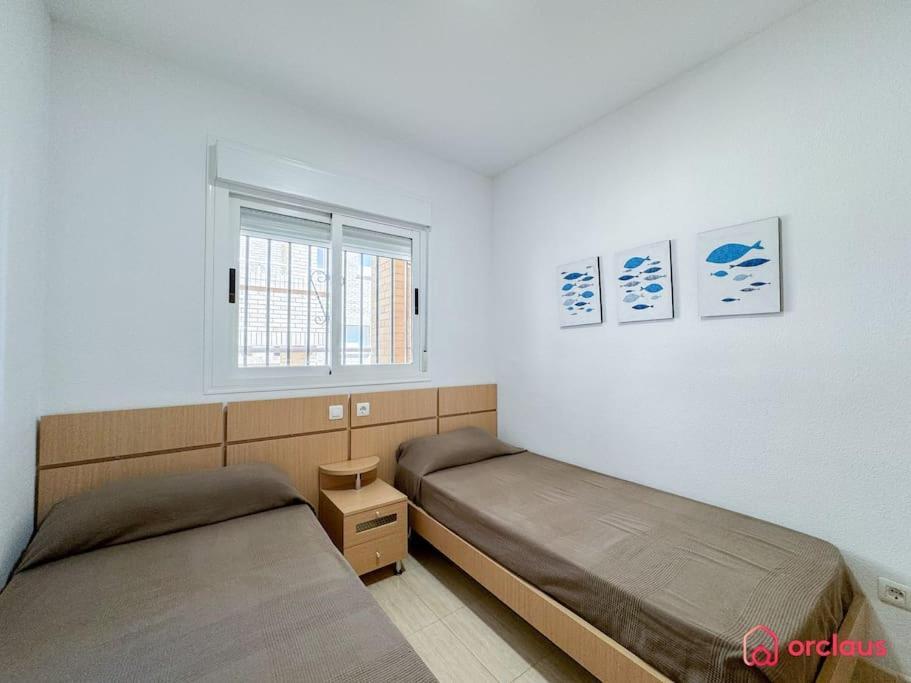 El Jardin Apartment โอโรเปซาเดลมาร์ ภายนอก รูปภาพ